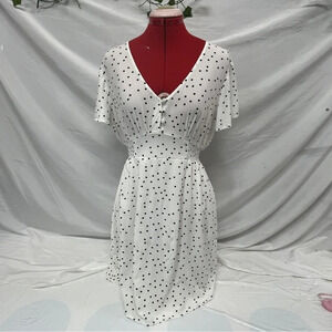 Impress white polka dotted dresssize large